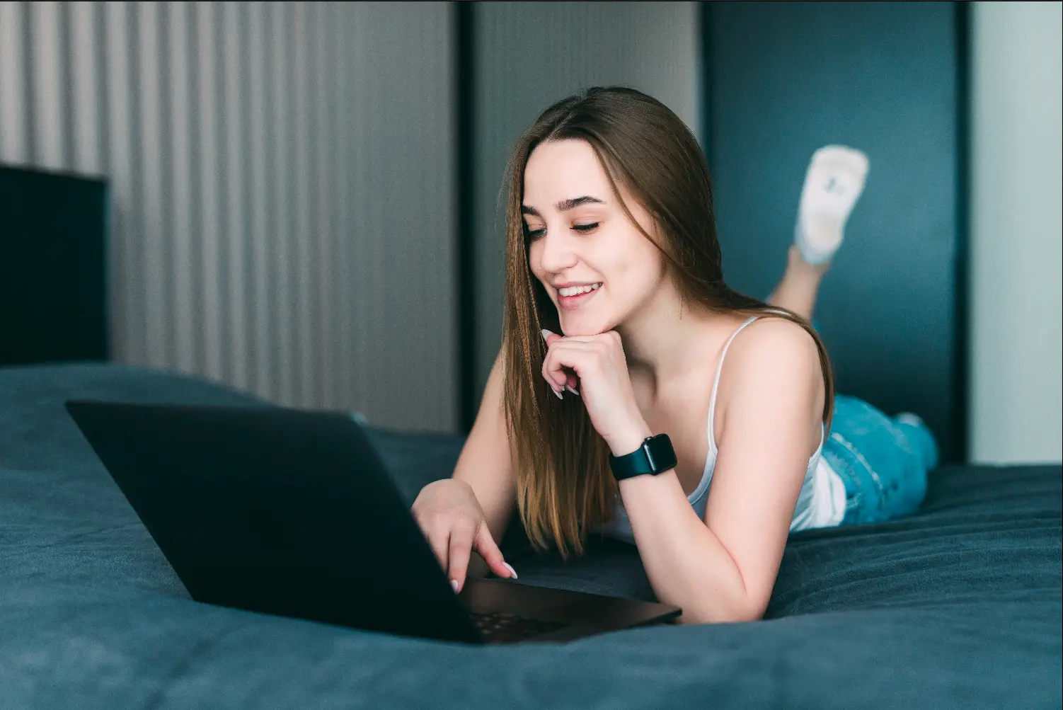 A woman chatting on her laptop.